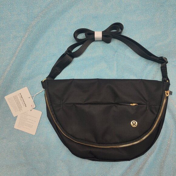 lululemon athletica Handbags - Lululemon All Night Festival Bag 5L Black Gold